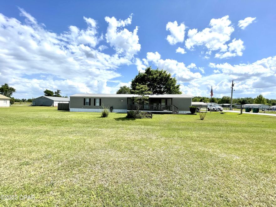 CURRENTLY UNDER CONTRACT, SELLER ACCEPTING BACKUP OFFERS.  3/2 on a beautifully manicured half acre, conveniently located and ready for a new family! This home has been added on to and remodeled to include a brand new master bath with a custom walk-in shower. Newer metal roof, HVAC, flooring, privacy fence, and more! You'll have ample storage space with added pantries, closets, and two outbuildings. Make an appointment to take a look!