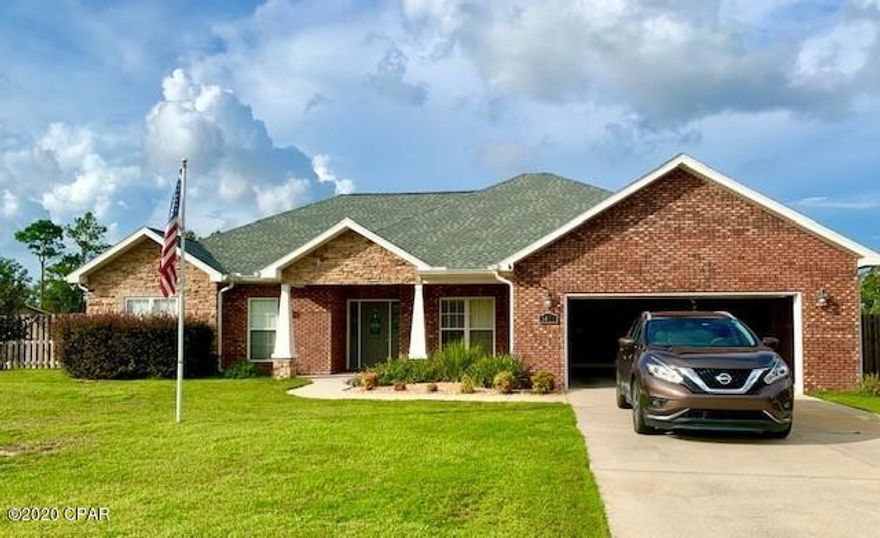 Great home on large lot w/ enclosed pool and workshop.