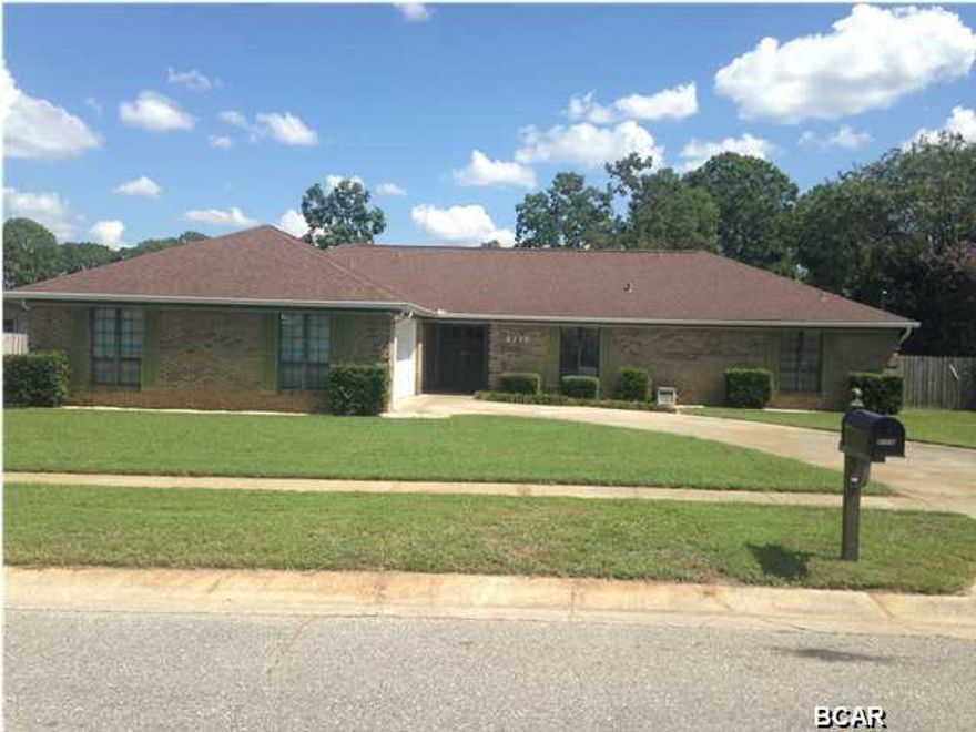 This beautiful four bedroom, 3 bath, all brick home is in a great central location for the Panama City area. The large fenced backyard with a kidney shaped gunite pool is awaiting your summer time fun. When the sun goes down you can enjoy the large screened in porch while you grill out on the covered patio. Much of the interior of the home has been updated. The eat-in kitchen has new tile floors, new granite countertops, a new refrigerator, and new gas stove. The kitchen is open to the family room which features a large fireplace. There is a separate dining and living room. The master bedroom includes his and hers walk in closets and attached bath with new granite counters, new double vanity sinks, and new tile in the bathtub/shower. The 4th bedroom and full bath is separate from