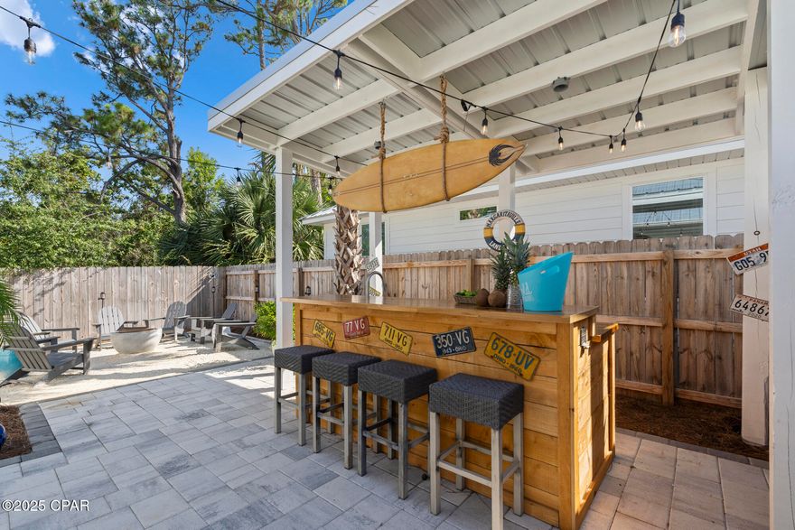 CURRENTLY UNDER CONTRACT, SELLER WILL CONSIDER BACKUP OFFERS       Your Coastal Escape Awaits - Fully Furnished & Rental Ready! Tucked just minutes from the beach and booked through June, this beautifully styled 4-bedroom, 3-bath home is more than just a property - it's an experience. Whether you're looking for a high-performing short-term rental or your own slice of paradise, 2402 Allison Ave delivers. 

Step inside and feel the difference: themed bedrooms like the ''Cowgirl Room'' and primary ''Surfboard Room'' charm every guest, while the open-concept living space flows seamlessly into a designer kitchen with quartz countertops, stainless appliances, and a cozy dining nook. The primary suite offers a spa-like retreat with a freestanding tub, oversized walk-in shower, and double vanity. 

But the true highlight? The backyard. Grill out under the pergola, sip wine by the fire pit, or serve up fun on your very own bocce ball court! This home was made for entertaining, relaxing, and maximizing the Florida lifestyle. 

Built in 2022, located in Flood Zone X, and offered fully furnished (exclusions apply), this property is turn-key ready! Just 1 mile from the Gulf, with no HOA and room to grow.

Income-producing, memory-making, and beautifully move-in ready - this one checks all the boxes!