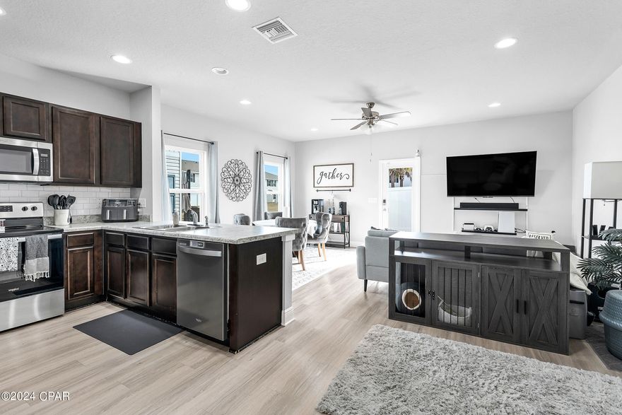 CURRENTLY UNDER CONTRACT, SELLER WILL CONSIDER BACKUP OFFERS. Welcome to your dream townhome! This stunning 3-bedroom, 3-bathroom gem is a contemporary haven with modern amenities, boasting luxury vinyl plank (LVP) floors for a sleek and stylish look. Built in 2020, this home is practically brand new, offering a fresh and modern living experience with a fenced in back yard.

As a corner unit, this townhome offers an abundance of natural light. Enjoy the bright and airy feel that enhances every room and creates a welcoming ambiance.

Conveniently located just 7 miles from Tyndall Air Force Base, this townhome is an ideal residence for military personnel or anyone looking for a hassle-free commute. Panama City Beach is just 14 miles away, where you'll have easy access to the beautiful Gulf of Mexico and its stunning beaches.

Don't miss out on this incredible opportunity to make this townhome your own! Contact us today to schedule a viewing and start envisioning your new lifestyle in this picture-perfect property.