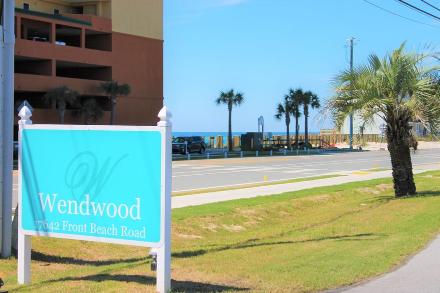 Well maintained & cared for Beach/Nautically themed unit. Large covered, front, patio. Public Beach Access is approximately within 0.1 miles (5 min. average walk). Tile flooring adorns the entire unit. Spacious Living Room. Dining Area. White & bright, Eat-in Kitchen w/Breakfast Bar Island & covered Patio. Front Guest Bedroom. Full Hallway Bathroom. Master Bedroom w/Walk-in Closet, en-suite Full Bathroom & private covered Patio. Easy access to FL. Hwy 79, Scenic Hwy 30A & Panama City Beach Pkwy. Dining, Entertainment, Shopping & Services are minutes away. Wendwood is convenient to the heart of the Tourism District of Pier Park. The complex's amenities include a pool shuffleboard & clubhouse.