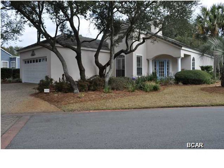 Sleek, stylish, pristine...all words that describe this Legend Place home. The sellers have updated and transformed the interior so it has clean lines and a chic modern design, yet remains functional and comfortable. The living area features a soaring tray ceiling that adds a dramatic flair and the fireplace anchors the room. The eat-in kitchen boasts granite counters, tile back splash, custom painted cabinets and a modern light fixture hangs delicately over the dining room table. Thanks to the split-bedroom floor plan, you'll enjoy extra privacy in the Master Suite. His-and-hers closets can be found in the hallway to the en suite which has true double vanities, a separate shower, and a whirlpool tub where you can soak away your worries. The covered patio off the living area and master