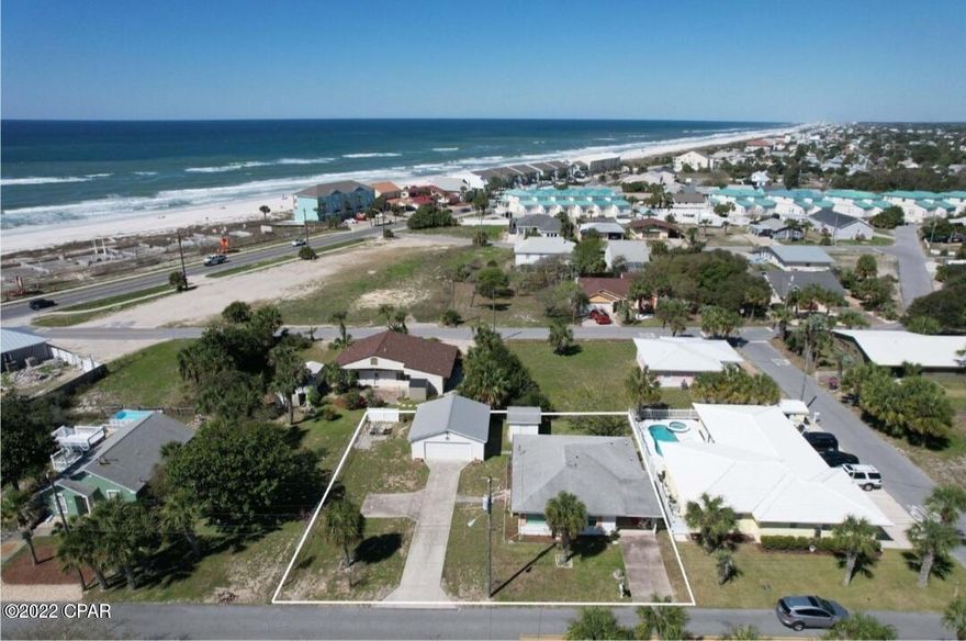 Very unique opportunity to own your own beach house on the quiet West End PCB with GULF VIEWS! Primary residence or second home gives the owner a chance to really immerse themselves into a wonderful community and enjoy a true beach lifestyle without having to deal with short term rentals as the city has restricted this area for that use. This block home has 2 BR and 2 BA ON A DOUBLE LOT and is positioned 1000 feet from the beautiful Gulf of Mexico. Stroll to the beach in two minutes and separate yourself from the crowd. No HOA allows the owner to take advantage of the property and have plenty of room for storage and vehicles. 24'x24' garage and a 10'x10' block building on the property. Endless possibilities with this property. Two story build would give the owner unobstructed Gulf views.