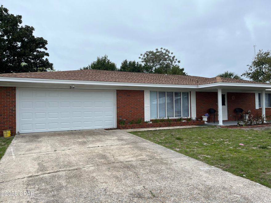 Remodeled brick home near Pier Park in Panama City Beach. Minimun Lease 6 months or longer  Walk, ride your bike or golf cart to nearby public beach access.  Home has a roomy layout with 3 bedrooms, 2 1/2 baths and large family room and enclosed porch.  Also, there is an attached double garage and outside garage/shed for your toys!  Large, fenced backyard is perfect for kids to play, grilling out or just to enjoy the sunshine.  Home can be rented furnished or unfurnished.   Owner pays for sewer and  garbage pickup. Pets allowed upon approval.