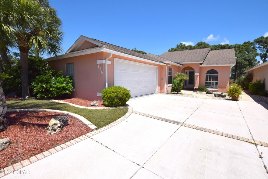 Centrally located minutes from the World's most beautiful beaches in the quaint neighborhood of ''The Glades'' sits this adorable stucco home with pool! Step inside this 3-bedroom, 2 bath and you are greeted with beautiful tile floors, a galley style kitchen with breakfast nook and a spacious living area overlooking the Florida room. The split floor plan offers privacy for the master suite that boasts vaulted ceilings, his/her closets, double sinks, soaking tub and separate shower. Walk outside and you will find a screened inground pool, attached garage, concrete driveway, outdoor shower and luscious landscaping. Home is conveniently located walking distance to the beach, restaurants and shopping.