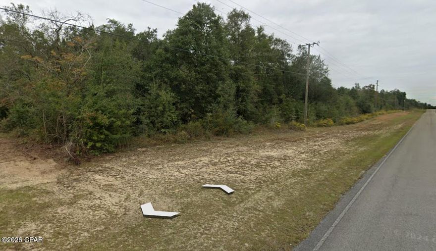 Discover this golf course lot in Sunny Hills, ideally located along Country Club Blvd. The lot appears to back up to Hole 12 on the Sunny Hills Golf Course, offering a peaceful setting with potential golf course views.  The property should have access to community water and electric, though buyers should verify all utilities for this specific parcel. Enjoy the area's nearby lakes, fishing, swimming, picnic spots, and outdoor recreation, with shopping, Northwest Florida Beaches International Airport, and Panama City Beach just a short drive away.

Additional non-adjoining lots are also available for purchase from the seller. Buyer to pay owner's title policy and title company closing fee. Buyer to verify all measurements, zoning, utilities, golf course frontage, and building requirements.
