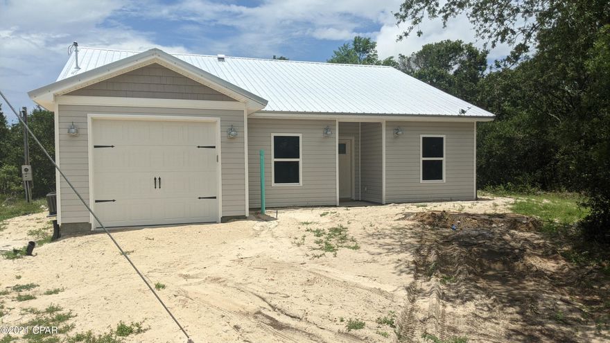 NEW CONSTRUCTION in a magnificent West End location! Smell the salt air as you step out of your front door for your five minute walk to the white sandy beach! Your beautiful new Beach House is nestled in a quiet golf-cart friendly neighborhood on the far West End, only 2.5 blocks off the beach, 5 minutes away from 2 large grocery stores and 7 minutes away from Highway 30A! Step inside and marvel at the high ceilings and beautiful luxury plank floors! The lighting, color palette, finishes and fixtures have been professionally chosen for that perfect Beach House look and feel! The chef in the family will love the beautiful kitchen with soft-close Shaker cabinets, granite counter tops, and stainless steel appliances. The large master bedroom has high ceilings and a huge master closet, and the master bath features double vanities and a lovely shower with floor to ceiling tile and a custom glass door! Smart Home features are modern and energy efficient LED lighting throughout, WiFi enabled garage door opener, WiFi enabled thermostat, and WiFi enabled irrigation! Designer interior colors, a garage, fully sodded and irrigated lot, and a beautiful patio in the backyard for grilling and entertaining! The house is on public sewer so there is plenty of room in the back yard for a swimming pool. Short term rentals are allowed. Construction is almost complete and this wonderful beach home is ready for you to call home!