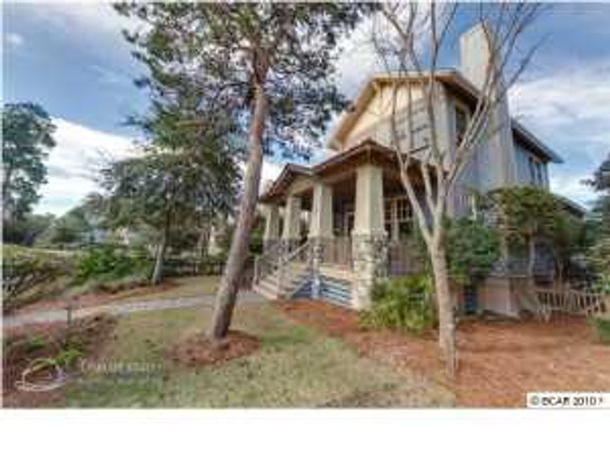 REDUCED PRICE! Pristine Wild Heron coastal craftsman style bungalow with beautiful finish work; large open floor plan, hardwood floors, wainscoting and crown molding, gas fireplace in living room, built-in cabinets in the dining room... Kitchen has gorgeous solid-maple cabinetry, granite counter-tops, stainless steel appliances and an extra-large pantry. You will love the master bedroom with a vaulted ceiling and the huge master bath with two granite vanities, garden tub and separate shower. Two additional bedrooms and a full bath complete the upstairs. One of your favorite features of this home will be the over-sized porch. Enjoy lavish amenities including gated entrance, boat house with kayaks and canoes, boat dock, lakeside pool and hot tub, beautiful fitness center, owner's