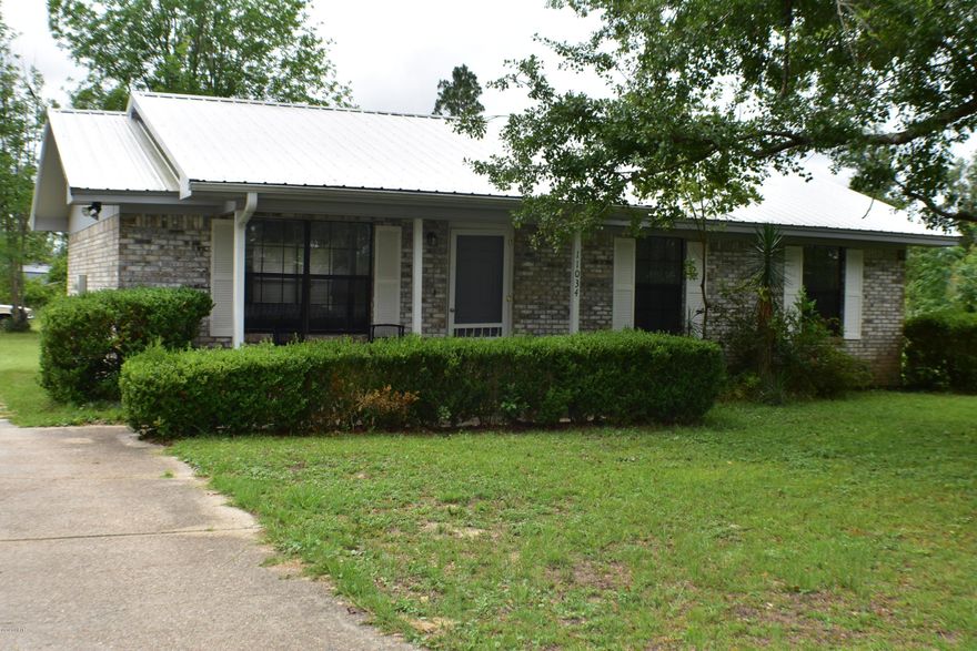 CURRENTLY UNDER CONTRACT, SELLER ACCEPTING BACKUP OFFERS. Looking to live outside the city?  Check out this charming all brick home on over 1/2 acre in the Bear Creek area!  The home has a metal roof, an open floor plan with  neutral tile in all main areas, 3 bedrooms and 1 bath.  You'll love the yard with all its fruit trees including a pear tree, several Satsuma orange trees, blueberry bushes, Loquat tree, and a huge pecan tree!  There is also a carport, a one car garage/workshop, and two storage buildings.  Great starter home or place for downsizing!  All info is approx and must be verified by Buyers if important.