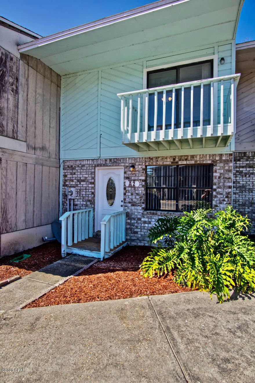 Walk Through Video Coming Soon. This property is not going to last long. At $89,900 your mortgage is going to be less than what you would pay for rent, and this unit is priced considerably below market value for a quick sale. The roof was replaced in Dec. 2018.  This 2 bedroom 1.5 bath town home is in move in condition and all tile and  hardwood flooring for easy maintenance. The downstairs features a 12.5x15 living room with wood flooring, deep inside storage below the stairs, and a half bath with tile flooring. The kitchen is toward the back of the first floor with an attached breakfast area and features sliders that lead to the private deck, fenced in back yard, and attached outside storage to store all your garden tools/lawnmower, or toys. The laundry room **Enter on More** is off the kitchen for added convenience. The upstairs features a master bedroom with a private balcony, Jack-and-Jill bathroom, and the 2nd bedroom. The 2nd floor is all wood flooring with the exception of the full bath which is tiled. This home is NOT in a flood zone, but located in "X" (non-flood). The HVAC compressor was replaced in 2009, water heater 2018, and the roof was replaced in 2018. If this sounds like the property you have been waiting for, make an appointment today to view before its gone. At this price it will not last! Age, Sq.Ft., Room Dimensions, Schools, Taxes, Lot Size, or any important information is an estimate and must be verified by the buyer if important.