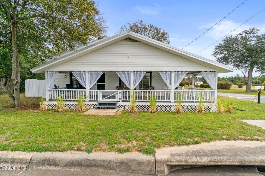 Charming 1945 historic home with timeless character awaits its new owners! This delightful residence boasts 3 bedrooms, 1 bathroom, and 1,435 square feet of living space. Relax on the large wrap-around front porch, lined with new curtains and rods. Inside, tall ceilings, original hardwoods, and wide trim/door casings take you back to a simpler time.

Updates galore! The roof was replaced in 2022, along with a new water heater in 2023. Electrical and plumbing systems received some updates in 2022 as well. Recent renovations since the owners purchased include new flooring in the utility room & kitchen, with fresh carpet in one of the bedrooms, a new subfloor on the back porch, refinished original hardwood floors, fresh interior and exterior paint, new drapes, and new ceiling fans. Updates in the bathroom feature new flooring, a new vanity and medicine cabinet, more functional shower option, and new window. Stay cool with 3 window air units, there are floor heaters when it gets chilly out. New window screens and landscaping enhance the curb appeal.

Situated on a generous corner lot, this home also offers a metal storage shed in the back yard. Located just half an hour from Dothan and an hour from Panama City Beach, this residence combines historic charm with modern comfort.