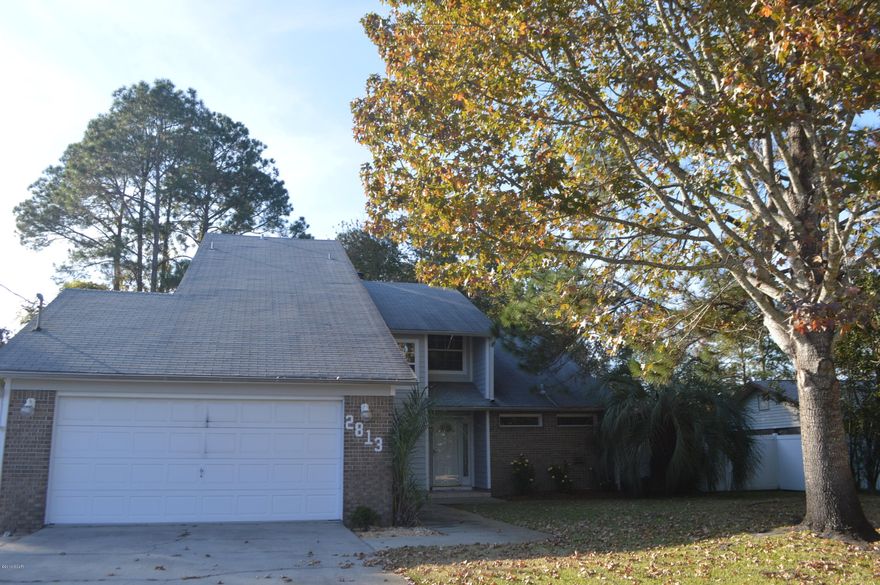 Spotless home, centrally located! This 3 bed 2.5 bath home has many updates! New windows, new doors, new wood-look tile and more. There is also custom decorative accents in the foyer and kitchen. The master bedroom is on the ground floor and has real wood flooring. It also has an exit to the ENORMOUS back deck! The large backyard is fenced and private. There is a small storage building for yard items, separate irrigation well and a concrete side driveway for RV or boat parking. Upstairs there are two guest bedrooms and a full bath. There is also a small ''nook'' that would be perfect for an office or playroom.