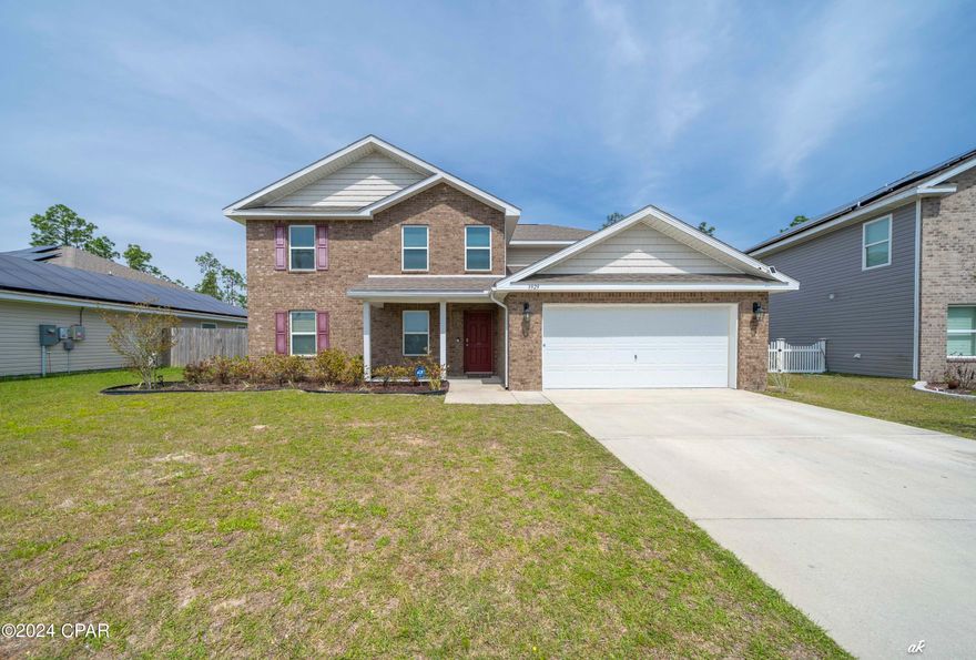 This 5 bedroom 2 1/2 bath house is for lease. This Fairview is a fantastic floorplan that includes a downstairs master suite. As you enter this home you will find vinyl flooring throughout all common areas and plush carpet in each of the bedrooms. Interior features of this home include traditional 8' ceilings, orange peel texture walls with quality paint, nickel hardware on interiors doors, a smart home technology system that will allow you to control your lighting, thermostat and even secure your home from a single touch panel. The downstairs master suite has a nice size bath with separate shower and large soak tub as well as a large walk-in closet. The kitchen is open to the large great room and the appliances include, stove, microwave and dishwasher. A powder room is located just off the foyer as well as a laundry room. This plan has four additional bedrooms upstairs that
share a bath and large living area. Magnolia Hills Phases one of our newest home communities conveniently located near
shopping and schools as well as Tyndall Air Force Base. This quaint community offers seclusion, quick access to HWY 231,
and the world famous beaches nearby!