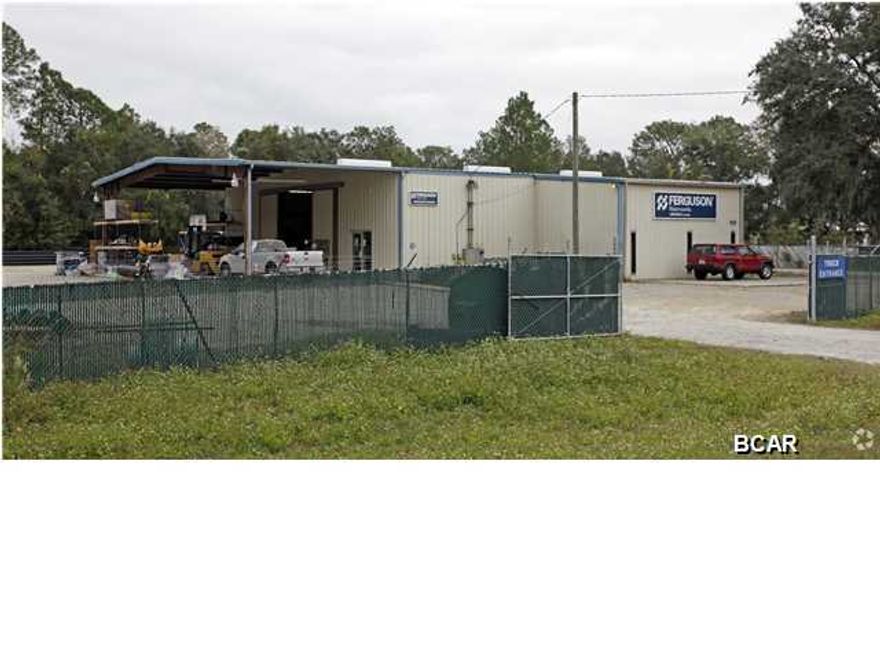 4,926 +/- sf Free-Standing Office/Showroom Warehouse with 6,300 +/- sf under roof. The warehouse is situated on 2.6 +/- acres with 1.0 +/- acre perimeter fenced for out-door storage and lay-down yard. The warehouse portion is 2,366 +/- SF with 16'5'' ceiling height at the center, one grade-level door 14'0'' (w) x 14'5'' (h). The office/showroom portion is 2,560 +/- sf with a showroom/ counter sales areas, two offices, conference room, file room two ADA restrooms and break room/kitchen. There is a covered canopy approximately 24' x 60'.The subject property located approximately 4/10th of a mile south of Highway 98 and north of 11th Street. Highway 98 is the area's major east/west commercial corridor. The subject property is convenient to Tyndall Air Force Base, downtown Panama C