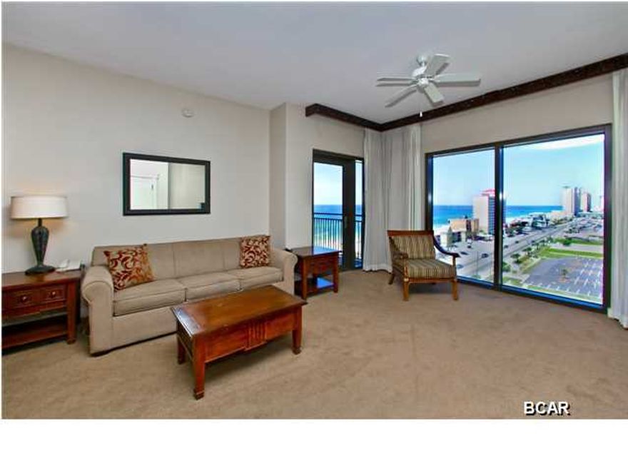 Looking for an incredible opportunity to own an affordable condo with stunning Gulf views? Now is your chance! Unit #1007 at Origin at Seahaven is a phenomenal fully furnished 1-bedroom condo with a private balcony, breathtaking views and full kitchen & bath. Access the private balcony from the living area and master bedroom and see stunning Gulf views from nearly anywhere in the unit. The balcony faces west so you will also encounter beautiful sunsets. Large wraparound glass window & doors bring the outside views in. The raised ceilings and open floor plan allow the unit to feel very spacious. The kitchen features tile floors & countertops as well as a granite breakfast bar. Plenty of contemporary wood cabinets and newer black appliances. There is a dining area for four. The