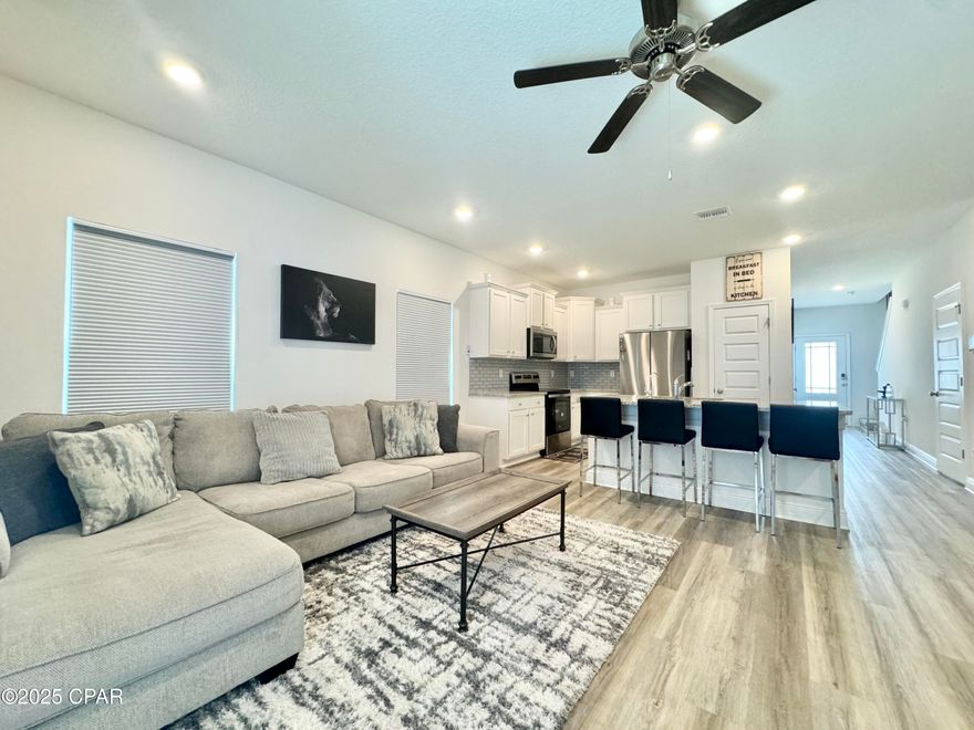 Discover coastal living at its finest in this beautifully appointed 3-bedroom, 2.5-bath home located in the highly sought-after Bayside at Ward Creek community. This thoughtfully designed residence features an open floor plan with a spacious living area, a modern kitchen equipped with stainless steel appliances, and ample closet space throughout. Enjoy a private patio, perfect for relaxing or entertaining. 

Ideally situated just five minutes from the beach, Frank Brown Park, and Pier Park, and only 10 minutes from Northwest Florida Beaches International Airport (ECP), this home provides exceptional access to shopping, dining, recreation, and the stunning Gulf Coast shoreline. Nestled in a quiet, peaceful neighborhood, it's the ideal blend of comfort, convenience, and tranquility.

Can be rented furnished or unfurnished.

Don't miss this exceptional opportunity to make this beautiful property your next home.