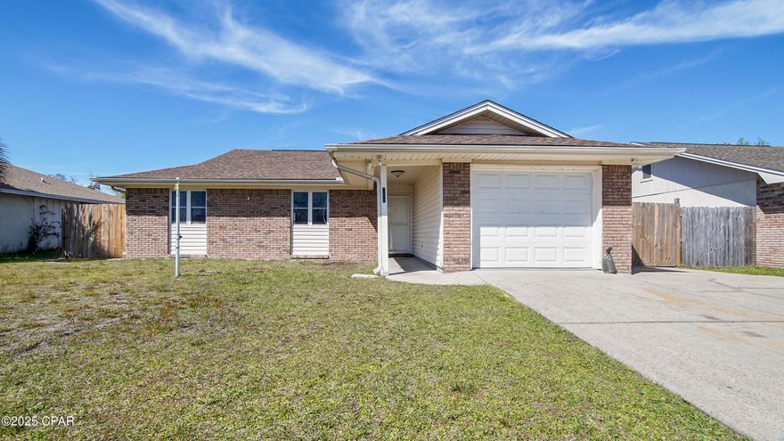 Welcome to this quaint 3 bedroom, 2 bath home nestled in a cul-de-sac in the heart of Lynn Haven. This home offers a blend of comfort and convenience.  Step inside to find fresh new carpet and crisp white walls, providing a blank canvas ready for your personal touch. The spacious kitchen features beautiful counter tops, ample counter and cabinet space, a pantry, and a breakfast bar overlooking the open concept living area - great for entertaining or casual dining.  A highlight of the home is the large sunroom, offering views of the fenced backyard - a peaceful retreat for relaxing or entertaining. Enjoy the outdoors year-round with a covered deck, an open patio, and a 12x20 workshop/storage space, perfect for hobbies or extra storage.  Located in this established Lynn Haven neighborhood, you will be just minutes from Mowat Middle School, shopping, restaurants, and parks with a convenient boat launch nearby. The 1-car garage provides additional storage and parking. Don't miss out on this fantastic opportunity! Schedule your showing today and make this house your home!