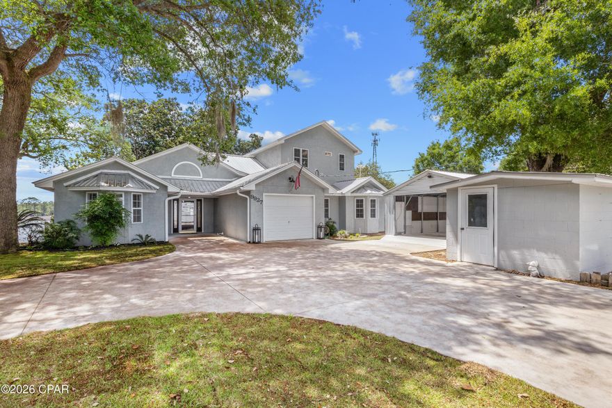 WATERFRONT on Burnt Mill Creek with GULF ACCESS!!  This listing also includes an income producing 1 bed/ 1 bath cottage that would make a great Airbnb rental. Don't miss your opportunity to live the Florida dream in this beautiful home with NO HOA! Take a trip to Shell Island from your backyard!  Enjoy fishing from your dock! Canoe, paddleboard & jet ski in your own private piece of paradise! If you love the outdoors and spending time on the water, then this is the perfect home for you!
This spacious home has fabulous views of the water from every room! The large living room features double French doors that open up to the Florida room with amazing views! The kitchen is equipped with beautiful granite countertops, a breakfast bar, custom cabinets and a large pantry.  The supersized laundry room with built in cabinets and a bay window could double as a home office. The screened in porch off of the dining area and kitchen is perfect for relaxing and watching the sunset. Upstairs you'll find the great master bedroom with French doors leading onto a screened in balcony that has gorgeous views of the water.  The home has a second master suite with a shower/tub combo, double vanity and a walk in closet with French doors that open to the Florida room.  Both of the downstairs bedrooms are a generous size and feature bay windows. For additional covered parking there is a 25' x 20' Carolina carport built in 2024. There are also two storage sheds on the property.  In the backyard, you'll enjoy outdoor living on the beautiful decks shaded by huge Magnolia trees that will keep you cool on those hot summer days.  There are two docks which provide plenty of room for your jet skis, kayaks and boats. The covered dock with a boat lift can accommodate a 21' boat, and there is filleting station to clean your fresh catch of the day with water and power available.  You can go up the creek for great bass and bream fishing or out to the bay to catch redfish and trout. Burnt Mill Creek is known for great speckled trout fishing in the winter. This home is located 7 min to   Northwest Florida Beaches International Airport, 15 min to the beach, and 15 to min to Lynn Haven for convenience of shopping if you don't want to fight the beach traffic during busy tourism times in PCB.  25 min to 30A, and 30 min to historic  downtown Panama City.  Short term rentals are allowed here, and this home could accommodate several families comfortably with 3667sf total area. The income producing 1 bed/ 1 bath cottage has a current tenant who's lease is up at the end of the year. 
Whether you are looking for your dream home on the water or a fantastic investment opportunity, this could be the one you've been waiting for!  GO SEE this wonderful property today! All measurements are approximate, please verify if important.