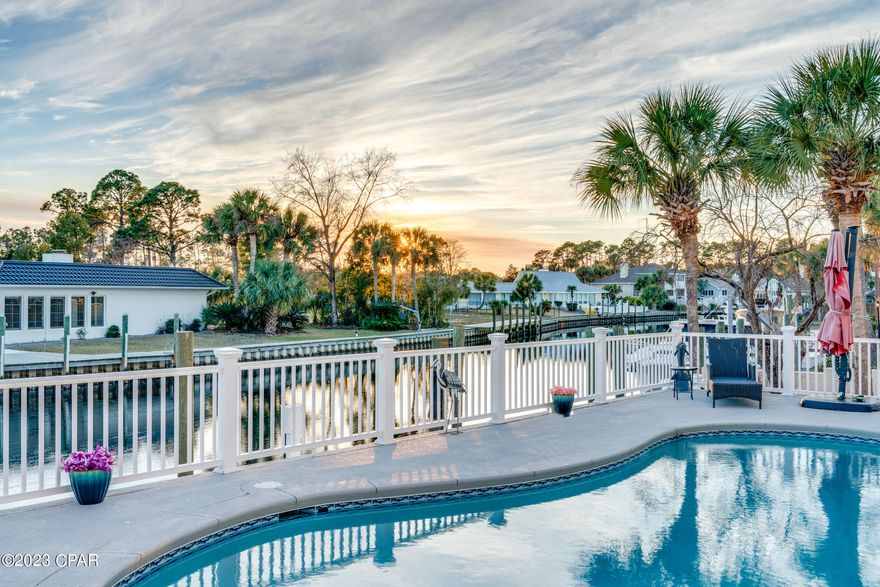 CURRENTLY UNDER CONTRACT, SELLER WILL CONSIDER BACKUP OFFERS **WATERFRONT IN GATED BAY POINT** This beautiful 4 bed, 4.5 bath canal front home is heavily upgraded, including a stunning updated kitchen, spacious living area, and a private pool, making it a fantastic place for entertaining both inside and out. Enjoy a short boat ride to open water or play 18 holes at the Nicklaus Golf course. The Bay Point Yacht Club is also in the neighborhood along with the Serenity Spa. Featuring an impressive kitchen, game room, Florida room, outdoor bar, outdoor shower and plenty of parking for guests, this beautiful home is certainly one to see. All bedrooms have their own bathrooms and there is even room to park the golf cart in the garage.