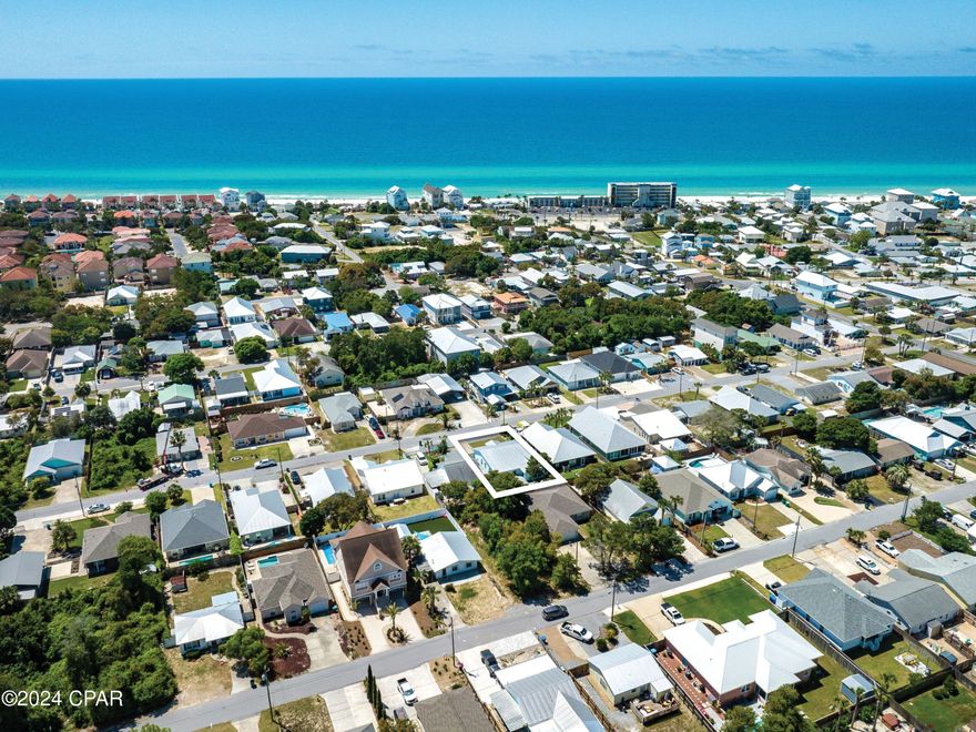 CURRENTLY UNDER CONTRACT, SELLER WILL CONSIDER BACKUP OFFERS. Discover the potential of this charming property nestled in the coveted Riviera Beach Villas community, offering ample space to add your own private pool and just a short stroll away from beach access. Situated on the desirable west end of Panama City Beach, this home presents an open floor plan that seamlessly blends functionality with coastal comfort. The spacious kitchen provides an ideal setup for entertaining or accommodating rental guests, while the tiled flooring throughout ensures easy maintenance and durability, perfect for a beach retreat. Each bedroom boasts its own distinct corner of the home, offering privacy and space for everyone to unwind. The expansive bunk room presents a fantastic opportunity to create a playful haven for children with some thoughtful updates. While the home may benefit from some updating, its inherent potential shines through, making it an excellent investment for those seeking a lucrative rental property or a second home by the sea. With plenty of room for a pool addition, the possibilities are endless for transforming this property into your own beachside paradise. Don't miss out on the chance to make your mark in Riviera Beach Villas, where the sun, sand, and surf await just moments from your doorstep.