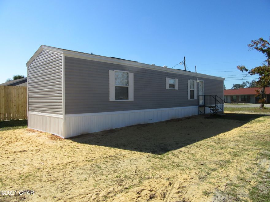 This very spacious 1 year old 2 bedroom 2 bath modular home centrally located in Callaway situated on a large corner lot is minutes away from Tyndall Air Force Base, shopping, dining and walking distance to the beautiful East Bay. Washer and Dryer is included in the lease. Brand new amenities to include but not limited upgraded stainless appliances, fixtures and an open floor plan with vinyl wood plank flooring throughout. All property sizes and ages are approximate, please measure and/or verify if important. School assignments are subject to change, please check with Bay County for most accurate information. Deposit is the same as the rent. No pets allowed.