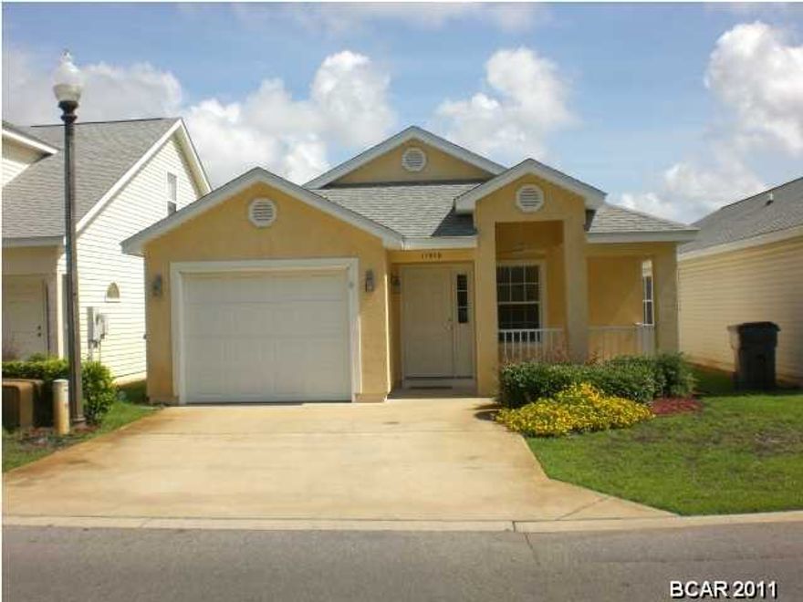 Nice patio home in Palm Cove - just a short walk to the beach. This is a 3 bedroom 2 bath home in a gated community with community pool.  This is a partially furnished home with a 1 car garage and screened back patio.