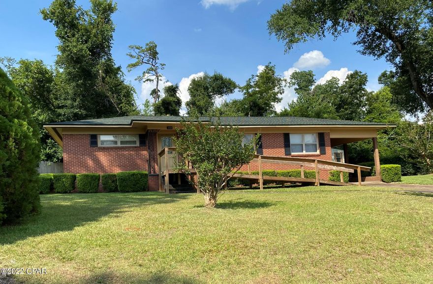 CURRENTLY UNDER CONTRACT, SELLER TAKING BACKUP OFFERS Conveniently located in Marianna this 3/1 could be the perfect starter home or for downsizing! It needs minor cosmetics however, has got some strong bones!! It has a new shingle roof, some stains in the ceiling from previous leak. There are no current leaks. Central heat and air unit is 3 years old, water heater 8 years old. Double pane windows throughout the house. Outside is an attached carport, shed and low maintenance yard with a handicap ramp. So much potential for this amazing home!!