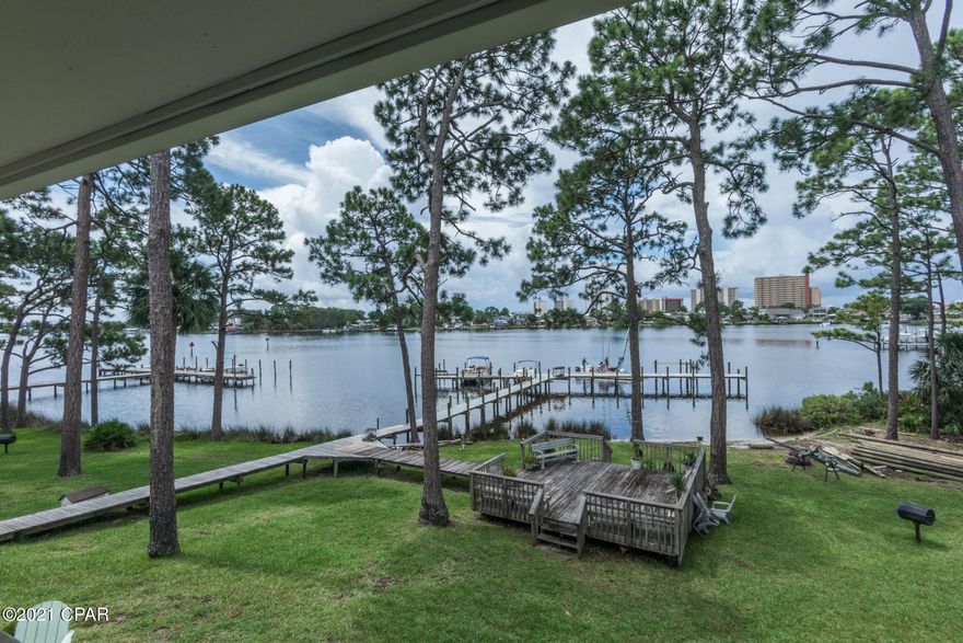 Beautiful Remodeled 

Lagoon Front 2 bed 2 bath Condo.

2nd Floor unit with Numbered Parking space out front of it. You will not find anything Water Front at this Price.Must SEE 

Master Bedroom with walk-in closet and Private Bath. 2nd Bedroom and Bath,

PLUS Huge Kitchen and Family Room area with Lagoon Views.

Sliding doors onto the Deck where you can relax, Enjoy the Views and Nature.

Even a Nice size storage room off of the Deck. (It has been floored with Wood Look Vinyl Plank Like the whole House !

Granite countertop island with under mount stainless sink. Fireplace with shiplap feature wall. Boat Slip does not Come with this Unit .You can get on a Waiting List Minutes to the gulf.