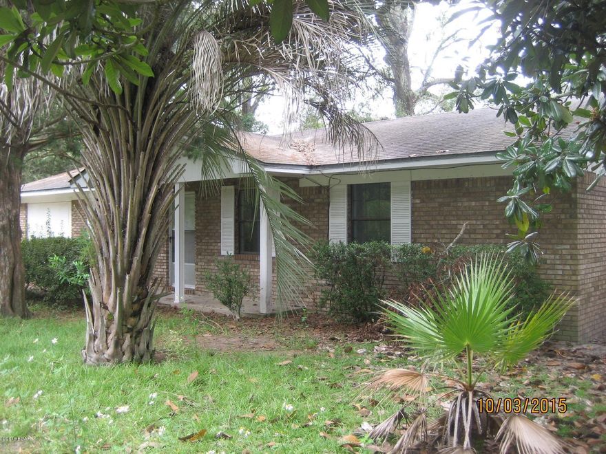 $25,900. This brick ranch home sits on the corner of 2 paved streets in small town, just a stone's throw from the Apalachicola River. The 78' x 118' lot is fenced and has numerous plants, shrubs, and trees. City water, sewer, and electricity. The home needs a new CHA system, new flooring, windows, possibly a roof, and bathroom updates. But at this low price a buyer can get into it reasonably and make repairs to either rent the home out or sell it as an investment later. The seller gives preference to vets or their surviving spouses, first responders, teachers, civil servants. There are 3 BR's, 1.5 baths, kitchen/dining combo, living room, and enclosed garage. $25,900.