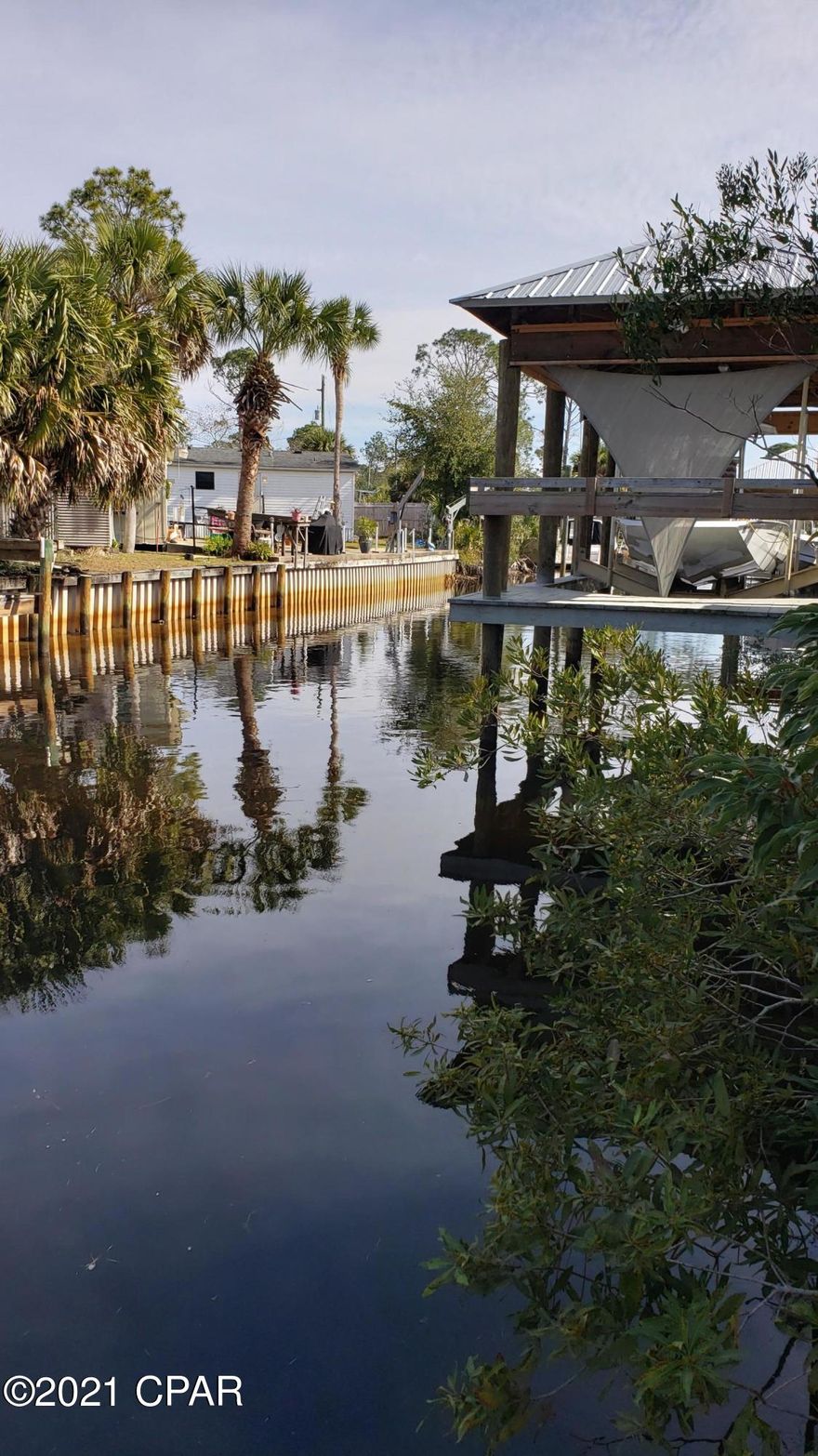 RARE FIND! Residential Lot on Canal with Gulf Access in a Gated Community under $100K. This lot can have a boat lift and site build for your dream home. This lot will not be on the market long. Lot is estimated at 50 X 68 with 50 ft of road frontage and 50 ft of waterfront.