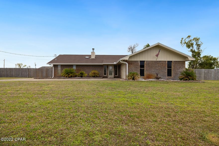 You will fall in love with this beautifully maintained brick POOL home in Lynn Haven.

Sitting on 1/2 an acre this home features 3 bedrooms, 2 bathrooms, and almost 1,800 sq ft. of comfortable living space. When you walk in you'll notice the open living and dining room area provides a great place for friends to gather. In addition, the kitchen is sure to bring out the chef in you with lots of counter space, stainless steel appliances, and white cabinets. 

The primary bedroom has a large walk in closet, a private access to the back patio, and an en suite bathroom with white vanity cabinets and a walk-in shower. The additional two bedrooms provide plenty of room for sleep and study, and share an additional full bathroom. Step outside into the back yard and you'll begin to imagine all the great times that you will have with family and friends! The paver patio leads out to the pool and tiki bar/grill area, and lots of green grass leading over to the side yard. This home is located on a quiet cul-de-sac street in Lynn Haven near College Point and also has a spacious 2 car garage, a separate laundry room, and is fully fenced in. Wonderful home and location, this is a must see in person!