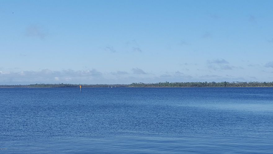 Storm Damaged Townhome.  Beautiful views and excellent potential with reconstruction.  Seller related to listing agent.