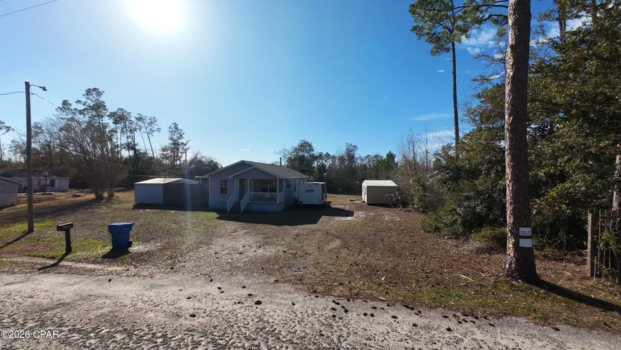 Endless possibilities await on this 0.458-acre lot in Southport! This well-maintained manufactured home sits on a quiet, dead-end road with minimal traffic, where homes are spaced comfortably apart, offering both privacy and peace. Zoned R-2, the property is incredibly versatile allowing for manufactured, single-family, or duplex housing - live in it, rent it out, renovate, remodel or start fresh and build your dream residence or multi-family investment. Two well-kept storage sheds and a very spacious all-around yard provide ample space for outdoor projects, play areas, pet roaming, equipment storage, etc. 
Just under half a mile to Fanning Bayou and the Donald Penny public saltwater boat ramp, this location is perfect for boating, fishing, or waterfront adventures. Only 12 miles to downtown Panama City, you enjoy convenience without sacrificing tranquility. You'll also enjoy a short 20 minute drive to the Northwest Florida Beaches International Airport, 30 minutes to Econfina Springs (local favorite), 35 minutes to Schooner's public beach access, and 27 minutes to the new TMH Urgent Care and full-service, 180 bed Hospital. 
Plus, as Southport expands and beachgoers flock to the coast, new construction is already underway. This is a rare chance to secure a property before the area fully develops. Tailor this purchase to your ideal lifestyle. It offers space to roam, room for large gatherings, and easy access to outdoor adventures like boating, fishing, kayaking, paddle boarding, and swimming. This is a canvas ready for your vision - move in now, rent as an investment, or build your dream home OR duplex!