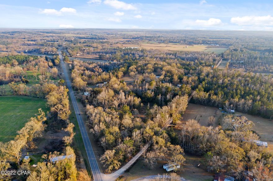 Excellent opportunity to own 29.33 beautiful acres located on Orange Hill Road! Build your dream home or replace the existing mobile homes and use as an investment opportunity. This Property borders Interstate 10 and features a well, 3 septic tanks, power and double-sided billboard. Lot is located just minutes from town.