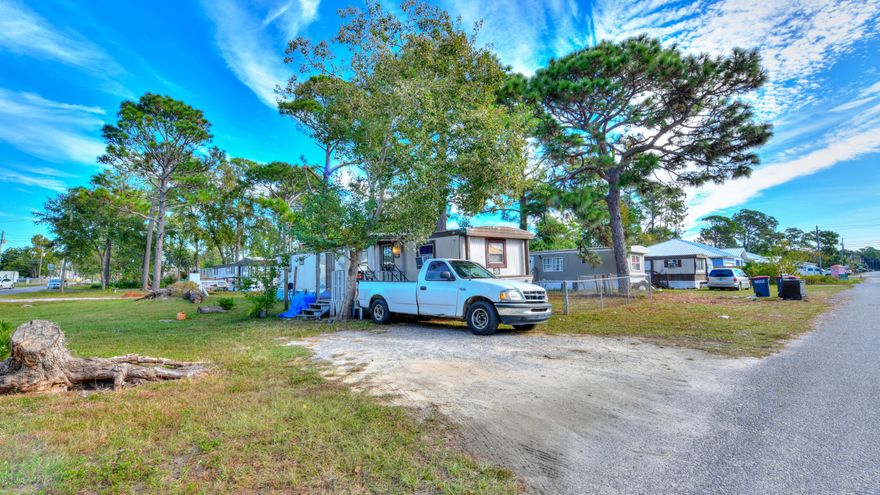 Great opportunity to own 3 investment properties located on a large corner lot in Panama City Beach. Combined monthly income is $2,600. Many new constructions homes being built in the area. Flood Zone X! Age, Square Footage, and room sizes approx., if important please verify.