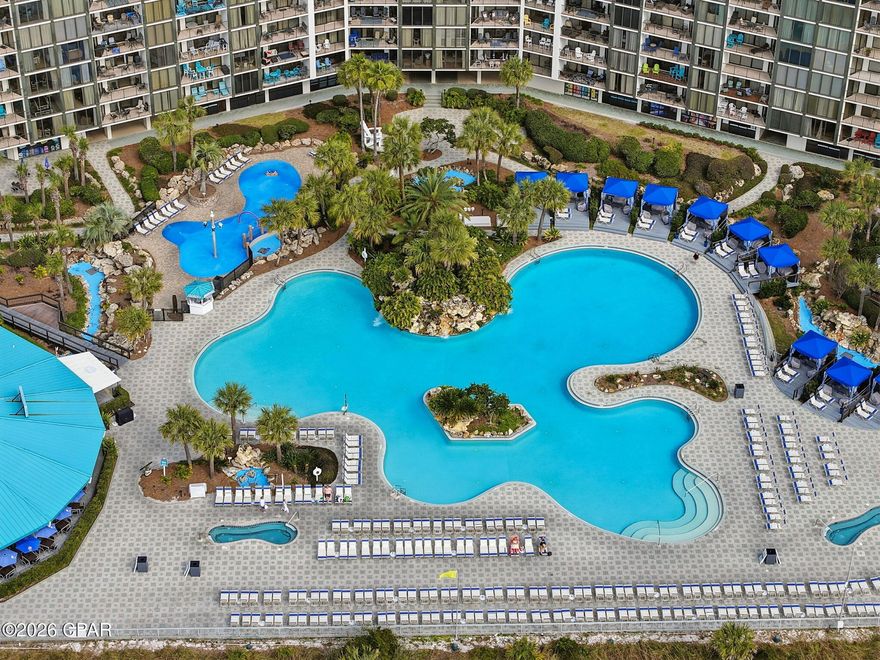 GORGEOUS Gulf front condo with exceptional rental history!  Located in Tower 3 of wildly popular Edgewater Beach & Golf Resort.  Professionally decorated and appointed, this gem offers luxurious touches with a spa like bathroom, kitchen with updated appliances, new a/c and lovely furnishings.  Known for its amenities, Edgewater boasts 11 pools, including the gorgeous lagoon pool with waterfalland cabanas just outside your door. Beachside dining and private beach access  A 9 hole Golf Course, tennis, pickleball and basketball courts.  Owners enjoy a 20% discount at resort restaurants and shops with free annual beach chair service and complimentary cabana rentals.  There is so much more including a Starbucks market, Ice cream parlour.  There is an EVcharging station on property and trailer parking area.  Dont miss the chance to own a stunning family resort condo that pays for itself in rental revenue.  Call for your showing today!