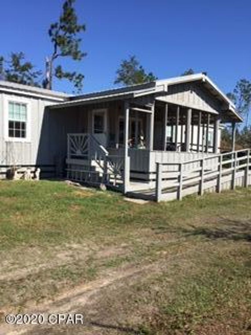 PROPERTY CURRENTLY UNDER CONTRACT, SELLER TAKING BACK-UP OFFERS.   Bring your horses or cattle nice little acreage with several water and electric hookups. Two pastures, one coral and a chicken coop. Area with several raised garden tubs. Three ponds, couple of yard buildings that need some work and  some yard work needed. Nice mobile home that has been taken care of. Some flooring is needed. Set of bunk beds come with the home.