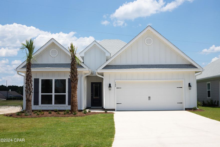 Welcome to Caballeros Estates at Hombre is stunning Panama City Beach. Live the Floridian life in style with just a 10 minute walk to white sandy beaches. This floorplan, the Kennedy, is a stunning single-story residence sprawling over 2,197 square feet including 5 bedrooms and 3 bathrooms. The home is a testament to modern design with a spacious foyer upon entry and a gorgeous kitchen that includes quartz countertops, Ivory Shaker cabinets, and a center island that overlooks the living. This abode is integrated with America's Smart Home℠ technology, providing both sophistication and convenience, all while ensuring a comfortable living space with its well-appointed bedrooms and smartly designed living areas.