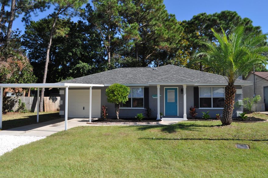 This Biltmore Beach area home has undergone a complete transformation in the last year.  The sellers spared no expense in the renovations and upgrades to make this 3BR/2BA beauty move-in ready!  Brand new roof and hot water heater, new wood laminate flooring and  tile throughout, Craftsman trim around the doors, new doors inside and out, new shelving in all of the closets and all new fixtures in the baths.  The kitchen underwent the biggest transformation with granite countertops, all Frigidaire stainless steel appliances and the wood cabinets have been refaced.  The backyard is privacy fenced and if you have a boat and/or RV, there's plenty of room on  the side to park both!  This home is also close to Grand Lagoon and the beach so you have plenty of water access.  Just 5 minutes from shopping centers, marinas and the Navy base.  Just wait until you see this home....you'll never want to leave!  All info is approx. and must be verified by Buyers if important.  Seller is a Licensed Florida Realtor.