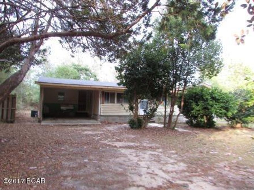 Country living but close to town! Here is the perfect opportunity to own 17 Acres in Bonifay!! 3 bedrooms 1 bath home with 1146 sq ft. Attached garage. Wood paneling walls thru out. Only 10 miles to shopping, dining and schools!  Home needs work. Being sold AS-IS.