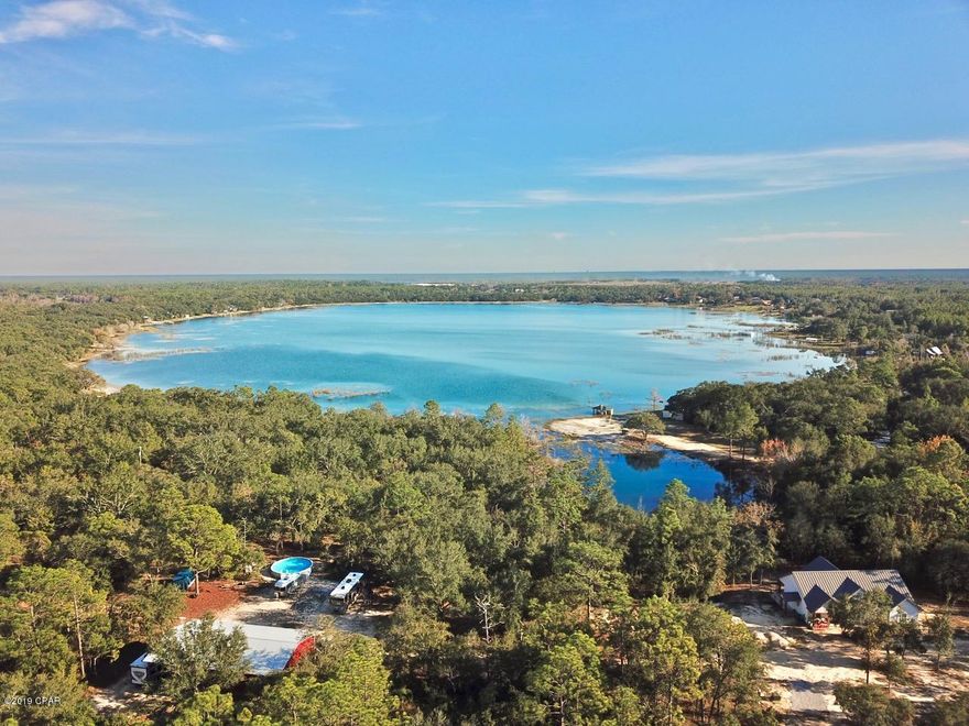 One of a kind opportunity to own 3.74 acres on the highly desirable White Western Lake. With approximately 430 feet on the water with white sand beaches where you can enjoy endless days of fun. The property already has a well in place so Whether you're looking to build your dream home or you just want a place to escape reality this is your opportunity. Call today for more information.