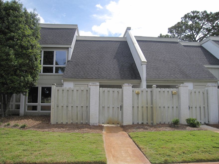 This rare 3 Bedroom Bay Point Golf Villa is located on the 9th fairway of the Club Meadows course. The kitchen has been updated with granite counter tops and stainless appliances. All the downstairs flooring as well as the carpeting in the bedrooms was recently  replaced. Insulation was added in the attic to improve AC operation and reduce power bills. Both the electrical and plumbing systems were updated to perform more efficiently. From your balcony, you have views of golf course ponds and beautiful fairways. Bay Point is a gated community with 24 hour roving security, 2 world class golf courses, clay tennis courts, 4 restaurants, an on site Sheridan Hotel, and a full service  marina just a short ride to the Gulf of Mexico!