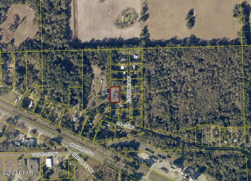 Discover a serene and captivating +-0.42 acre lot, surrounded by beautiful oak trees. This remarkable property offers an idyllic escape where you can immerse yourself in nature's wonders while still being close to town. This parcel  has a recorded easement off of  the adress 1414 NW 2nd ST, Live Oak, FL 32064.  Land previously had a mobile home on it.  There may be water and septic hook-ups, buyer to verify. Owner has not been to property since purchased. All measurements are sourced by public record and approximate. Come see it for yourself and make it yours today!