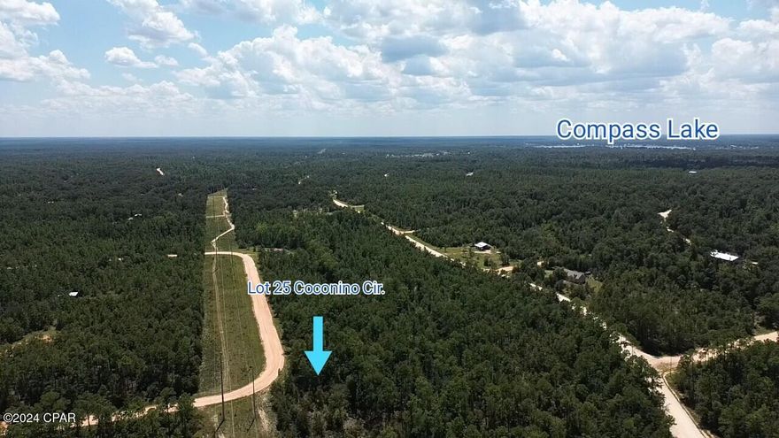 This is a large 1.1 acre wooded lot in the Compass Lake subdivision. Compass Lake (see pic) is an all-sports lake, offering water skiing, tubing, jet skiing, pontooning, power boating, sailing, wakeboarding, canoeing, kayaking and swimming. In keeping with its reputation as a boating lake, a restaurant along the shore is accessible by boat. Most of the shoreline provides a natural sand beach. Located about half-way between Panama City, FL and Dothan, AL, Compass Lake is only 10 miles from Marianna and Interstate 10. The area is rich in historical significance, with many restored antebellum plantation homes open for tours or as bed-and-breakfasts. Nearby Alford holds a grocery store and some basic services, while Marianna contains nearly everything a resident would need. About 30 miles south, Panama City Beach offers public Gulf beaches and marinas for 'big water' boating plus big-city amenities and attractions. The entire area around Compass Lake is filled with unique geological treasures, some of which are state parks. Two well-known attractions near Chipley, Falling Waters State Park and Caverns State Park, both display in spectacular fashion the effect of eons of water flowing across the ancient limestone. There is a voluntary POA with a low yearly fee of $135.