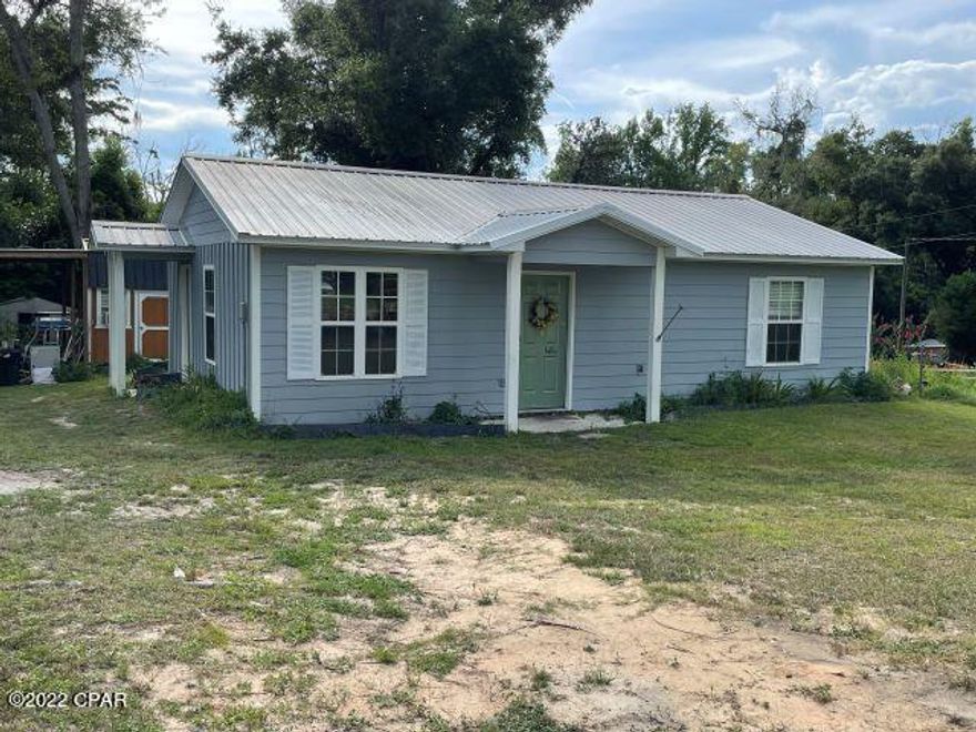 $115,000.  'SALE PENDING'. This cozy cottage is great for a couple, or could be used as a short-term rental such as AirBnb! A solid concrete block home originally built in maybe the 50's, the home was gutted and completely rebuilt in 2007. Upgrades include roof, windows, CHA, flooring, wiring, plumbing, and more! The 2 bedrooms are plenty spacious and have adequate closet space. Situated on a corner lot in small NW Florida town, you can walk to the post office, convenience stores, local restaurant, or to the river just around the corner and down the hill. Owner is selling the home with stove and refrigerator; dishwasher will also remain, but it isn't connected. Everything in the home was updated and/or replaced in approximately 2007. Comfortable and cozy home in town for just $115,000!