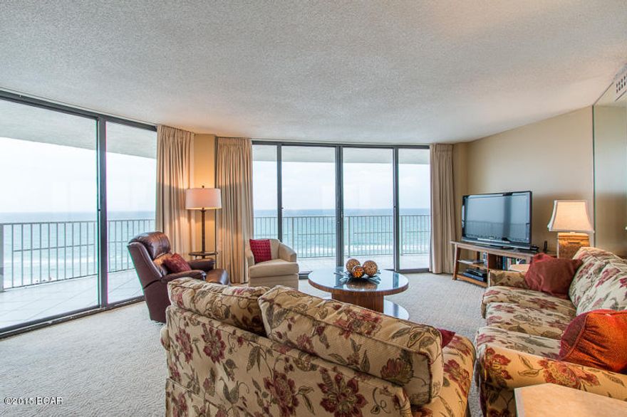 WOW, Gulf front living at its finest! More than 50 feet of porch overlooking the beautiful beaches of Panama City Beach, FL. This 1800 sq.ft., end unit is located on the 8th floor in the newest building of Dunes of Panama. This remodeled, 3 bedroom is absolutely spectacular from the moment you walk in. It feels as though you’re in your own private home. All the rooms are oversized and come furnished as well. The 18x16 master bedroom as a private entry to the porch. As well as a separate vanity area from the bathroom, and a great size walk-in closet. The amenities include 3 pools, 1 which is heated, an arcade, pool deck, grill, tennis courts, and RV & Boat parking, plus much more. For more information on rental income contact us today!