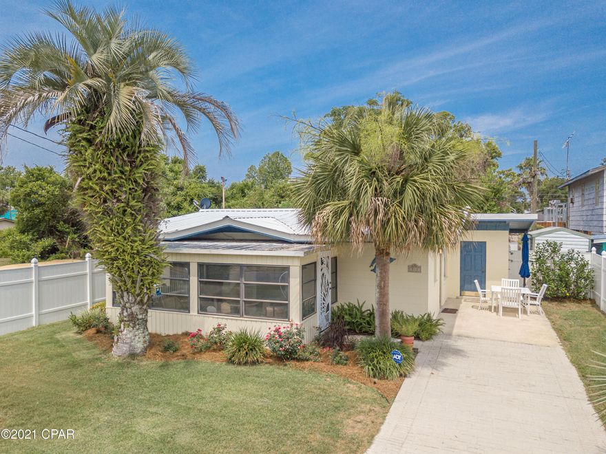 Under contract seller is accepting back up offers. What a Laguna Beach Doll house!!! This vintage home is so sweet. This charming 1967  Block home has Terrazzo floors, a Florida room,metal roof and is absolutely adorable.The yard is beautifully landscaped with sprinkler system,two storage sheds and a small & cozy fenced back yard. The location is Brilliant! This Golf Cart friendly area  has an awesome beach lifestyle. Laguna Beach is known for it's reserved beach area,the locals' Beachy Grocery store( with a Gift shop,wine cellar & a liquor store) & a Donut shop that are all directly across the street from the beach. Laguna Beach is not just a place it is more of a Lifestyle! Come see