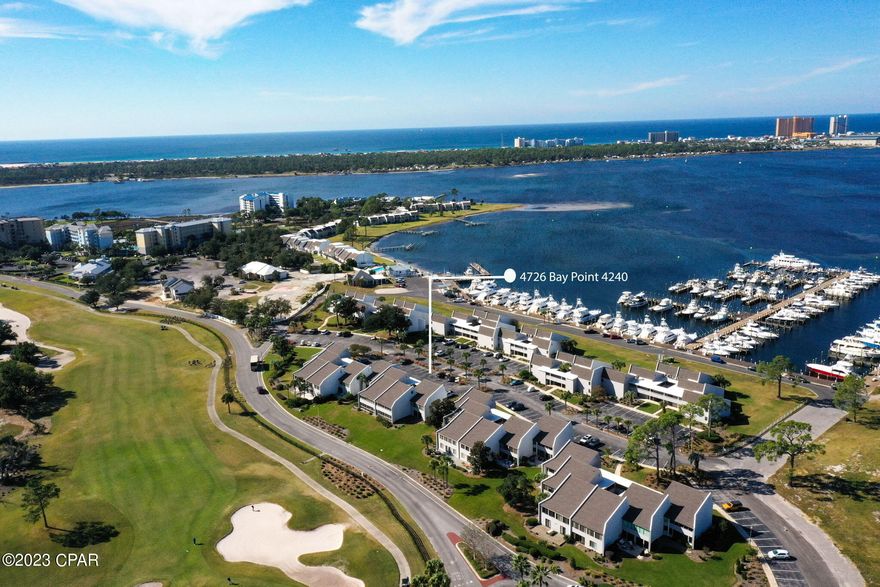 CURRENTLY UNDER CONTRACT, SELLER WILL CONSIDER BACKUP OFFERS' Seller willing to consider all offers. Bay Point Harbour Villas- Stunning 1-bedroom unit overlooking the Nicklaus Golf Course, and pond. The most stunning sunsets and panoramic views of the Golf Course. This unit features granite countertops, upgraded kitchen cabinets. The kitchen overlooks the living & dining room, with the most stunning views through the oversized windows, allowing for plenty of natural light. The bathroom includes a separate vanity and closet area, which allows two people to get ready at the same time, but in privacy. This unit does allow for short term vacation rentals. If you are looking for a move-in ready property, that will leave you feeling like you are on vacation all day long, this is it! If you are not familiar with the Bay Point Community, you are in for a treat. Featuring 1500+ single family homes and multi-homes, condos, and resorts, this is truly a gated community with 24-hour security. Bar 72 provides casual dining, and a full-service breakfast on Fridays, Saturdays, and Sunday. Bay Point is a community within itself featuring Bluegreen's Bayside Resort and Spa, The Nicklaus 18-hole golf course; Point South Marina, Marriotts Legends Edge, and so much more. There are numerous clubs and organizations within the community such as the Men's Golf Association, Women's Golf Association, Bay Point Women's Club, Pay Point Yacht Club, and Bay Point Tenns Association. If this sounds like the luxury resort you have been looking for, contact your realtor for a private showing before your dream of owning a piece of paradise becomes someone else's reality.