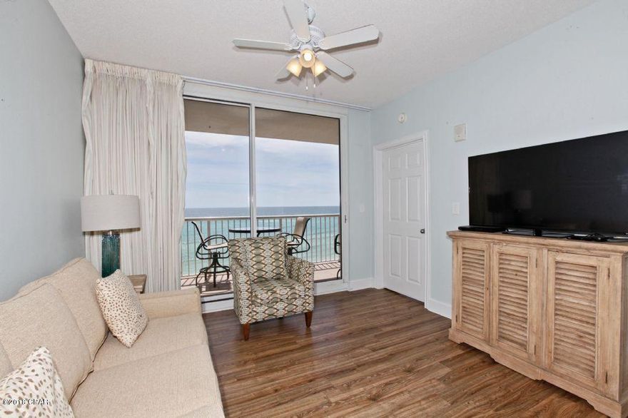 BEST OF THE BEST IN MAJESTIC! PERFECT ELEVATION WITHIN THE STACK! TWO DEDICATED PARKING SPACES WILL CONVEY WITH FULL PRICE CONTRACT! This one of a kind property conjures up images of sun-splashed days of swimming, biking, and relaxing. It lives like a beach house but comes with all the benefits of owning a condo. This property has been meticulously maintained. Hard surface flooring throughout and conveys with luxurious furnishings, window treatments, and artwork that welcome you to lie back, relax, and enjoy panoramic views of the pool, beach and ocean. Condo has 9' ceilings and crown molding throughout. Open floorplan allows for fabulous Gulf and sunset views from balcony, living room, dining room, kitchen, & master suite providing the ultimate alfresco living and entertaining environment The fully equipped kitchen features upgrades such as solid granite kitchen countertops, stainless steel appliances, upgraded sink, and tumbled marble backsplash & breakfast bar. Sunset views from the tiled, private, balcony are a perfect end to a sunny day and beginning to an exciting evening. MAIN MASTER SUITE is front and center on the beach with direct access to the main balcony and private bath complete with granite counter tops, custom sinks, garden tub, separate shower, and large walk-in closet. The master suite opens from a glass slider door to a covered balcony. LUXURY! COMFORT! CONVENIENCE! Can be configured to sleep up to 10 people! EXCELLENT RENTAL INCOME POTENTIAL. Enjoy the good life at Majestic Beach with an unparalleled deck of resort style amenities including: 650 linear feet of sugar white GULF FRONTAGE, Four Large outdoor pools (2 at Tower I and 2 at Tower II), Two Indoor heated pools (one in Tower I and one in Tower II), Two hot tubs, Baby pool, Wading pool with waterfall, H20 Bar and Grill serving Gulfside/Poolside lunch and dinner, Large outdoor dining area, State of the Art Fitness center with steam room and sauna, 130 seat Stadium seating Movie Theatre, Convention center, Private Owner's Lounge with full Kitchen, Tennis Courts, Majestic Market featuring Starbucks coffee. Quick distance to the the wonderful shopping, dining and entertainment at Pier Park. FROM THIS CONDO, YOU ARE WITHIN STEPS OF EVERYTHING YOU COULD EVER WANT AT THE BEACH!